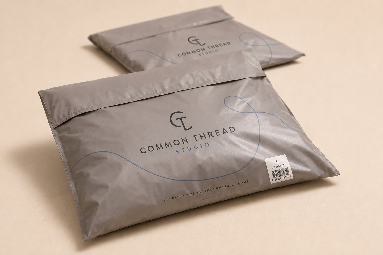 Custom printed poly mailers for the fictional Common Thread Studio brand